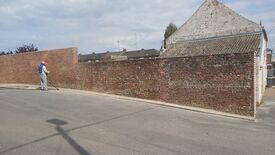 Rejointoiement du mur du parking de la salle Anquetil